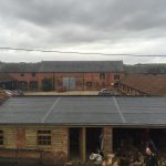 Spanish Slate Tile Effect Roof On Farm Buildings.