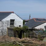Grp slate tile roof on left, traditional slate on right. Spot the difference!