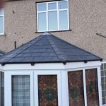 Conservatory roof in fibreglass slate tile panels